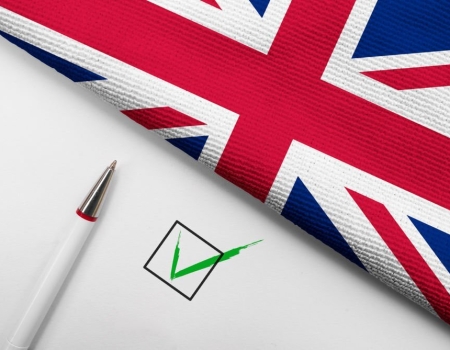 Pencil, Flag of United Kingdom and check mark on paper sheet